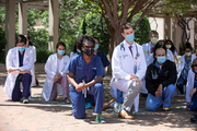 Drs. Victoria Jackson and Daniel Guidot kneeled beside fellow Internal Medicine residents.