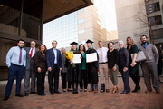 Dr. Emily Kromann and Dr. Brett Smilie, doctors of physical therapy, and their families