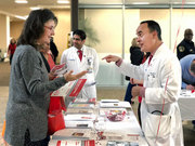 People come to the health fairs because they want to improve their health, said Dr. Amit Khera (pictured, right).