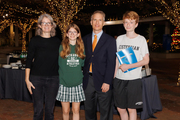 Dr. Gerber at the reception with his wife, Lara, daughter Allie and son, Cub.