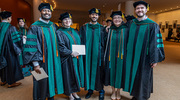 From left: Dileep Karri, M.D., Ph.D., Savannah Taylor, M.D., Ph.D., Sherwin Kelekar, M.D., Ph.D., Luming Chen, M.D., Ph.D., and Cooper Mellema, M.D., Ph.D., are all smiles in anticipation of the start of the commencement ceremony.