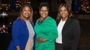 Colleagues Tiffany Bradshaw (left), Bettina Long, and Constance Kemp enjoy a perfect night on the Plaza.