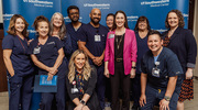 Health System employees gather for a group photo.