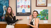 Kathryn Cavanaugh (left) and Brittney Hubbard were members of a team to produce Blossoming With Individuality, an artwork piece that received honorable mention in the Corporate Collaboration category.