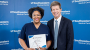 Donna Mitchell, a Clinical Research Coordinator Lead in Urology, receives the 2024 Mentorship Award from Dr. Peterson for her commitment to nurturing talent within her research team.