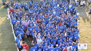 UTSW community members wave to the cameras above for the group photo op.