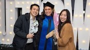 Karen Atilegna Dorsman, Ph.D., takes time for a celebratory photo with her family.