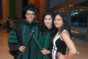 UTSW Medical School student in lobby with loved one following commencement