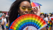 Parade: UTSW employee Keneshia Colwell shows her support at the Dallas Pride Parade.