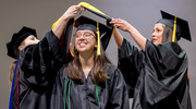 More than 130 School of Health Professions students celebrated graduating Dec. 14 at a commencement ceremony. The event marked achievement of doctorate and master’s degree programs in multiple allied health fields. Above, a proud 2024 graduate receives her hood at the ceremony.