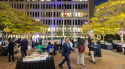 Guests enjoy perfect weather during the outdoor reception on the McDermott Plaza.