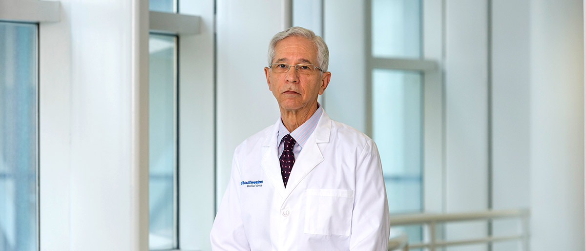 Man in white lab coat