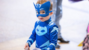 Catboy poses for a photo with his Halloween haul.