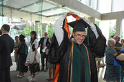 UTSW Medical School students in lobby following commencement