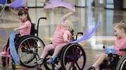 Three Ayita Wheelchair Dance students delightfully perform their routine at the UT Southwestern DFW Adaptive Sports Expo in September. The event is organized by the UT Southwestern DFW Adaptive Sports Coalition, UT Arlington, the UTSW Department of Physical Medicine and Rehabilitation, and the Peter O’Donnell Jr. Brain Institute, among others. This event is designed to increase awareness of adaptive sports and promote active, healthy, and engaged lifestyles. 