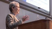 Joan Conaway, Ph.D., Vice Provost and Dean of Basic Research, opens the event by welcoming the audience to the New Faculty Research Forum at which 18 Assistant Professors presented their research.