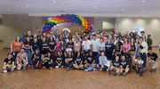 More than 100 people attended the brunch and posed for a group photo.