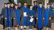 Cancer Biology graduates and their mentors celebrating commencement include (from left) mentor Esra Akbay, Ph.D., Assistant Professor of Pathology; Mingrui Zhu, Ph.D.; mentor Ping Mu, Ph.D., Assistant Professor of Molecular Biology; Carla Rodriguez Tirado, Ph.D.; mentor Srinivas Malladi, Ph.D., Assistant Professor of Pathology; Mauricio Marquez Palencia, Ph.D.; Yan Fang, Ph.D., M.S.; mentor Ian Corbin, Ph.D., Associate Professor of Internal Medicine, Radiology, and in the Advanced Imaging Research Center; Joseph Bower, Ph.D.; and Ester Alvarez Benedicto, Ph.D.