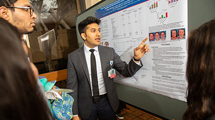 Student presenting poster submission
