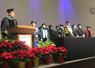 Nate Foreman (left), Dean Dr. Williamson, Associate Dean Kim Hoggatt Krumwiede and other faculty members during commencement