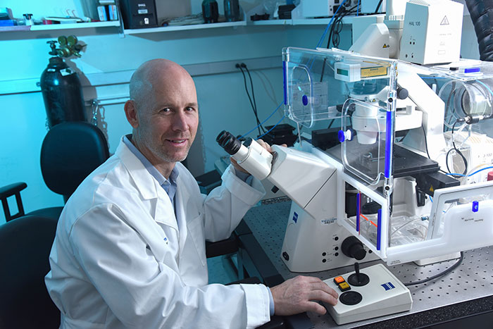 Dr. Neal Alto in the lab