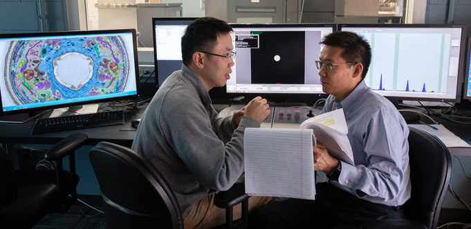 Dr. Xiao-chen Bai (left) and Dr. Hongtao Yu