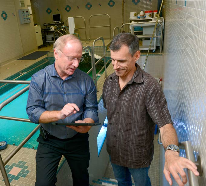 Dr. Levine with long-distance swimmer Ben Lecomte 