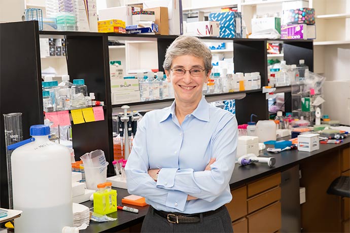 woman blue shirt in lab