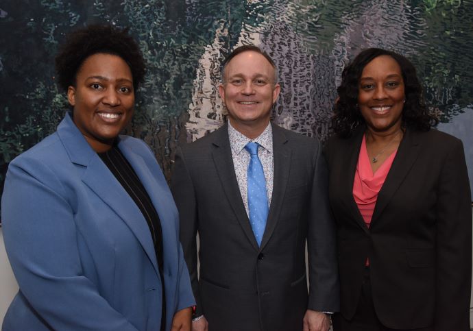 3 UTSW associate deans stand side by side: Dr. Dorough black woman in blue blazer (left), Dr. Smith white man in gray suit with light blue tie (center), Dr. Bradley-Guidry black woman in black blazer and orange blouse (right) 