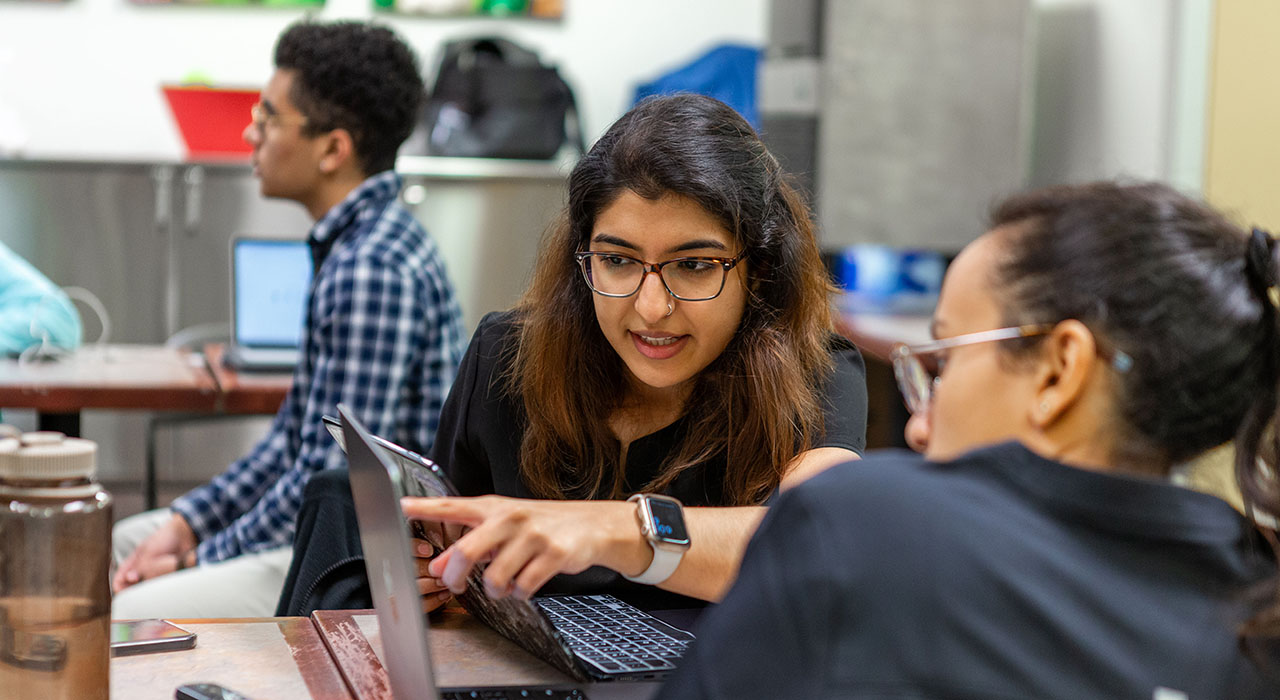 Med students working behind the scenes at Brother Bills helping hand