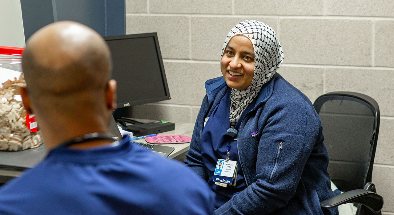 Faculty volunteer at Brother Bills helping hand