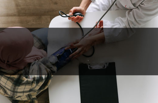 person getting their blood pressure checked