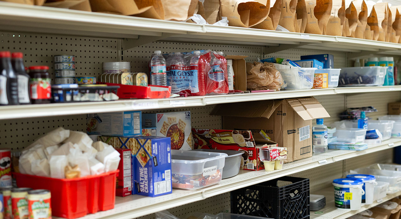 Shelves of donated food at a food pantry