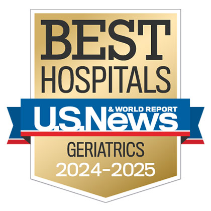 Gold badge with blue ribbon and text that states Best Hospitals U.S. News & World Report Geriatrics 2024-2025