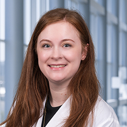 Dr. Hannah Smith, wearing a white lab coat