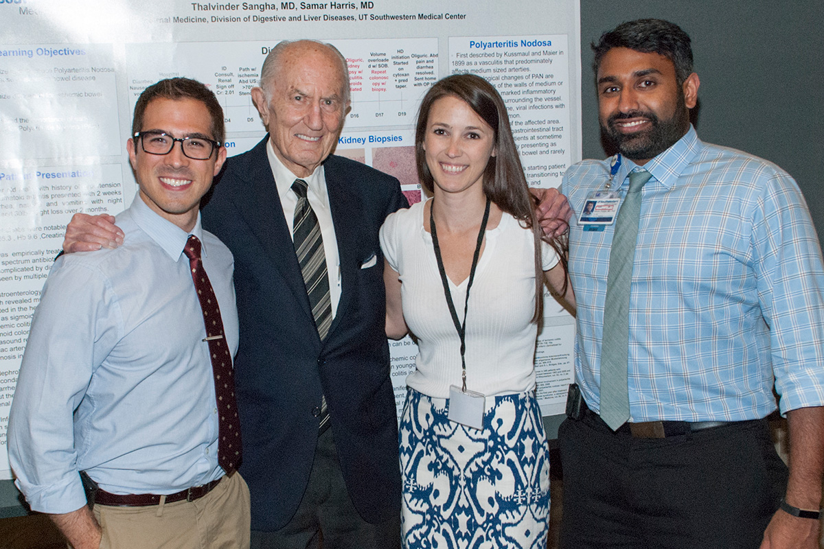 Dr. Donald Seldin during the inaugural symposium with the three chief residents