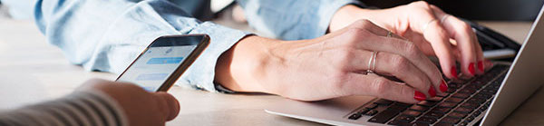 Person typing on a laptop