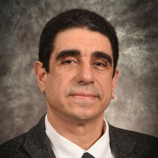 Dr. Luis E. De Las Casas, M.D.