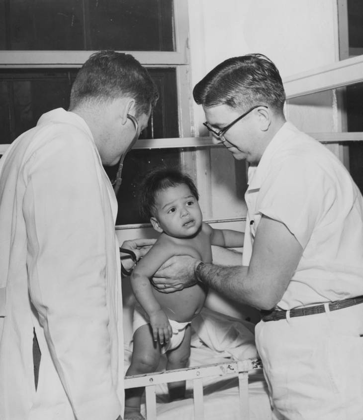 physicians with child 1964
