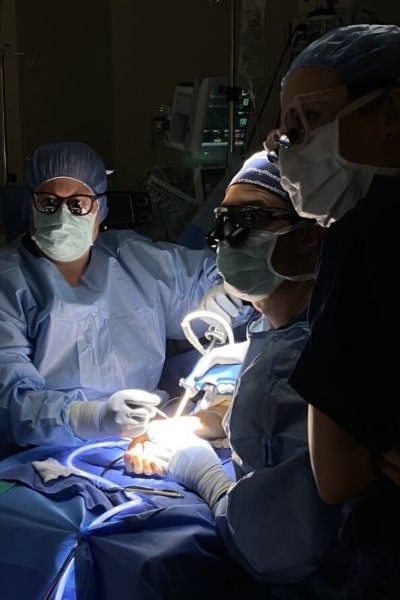surgeon Dr. Douglas Sammer performs operation on hand