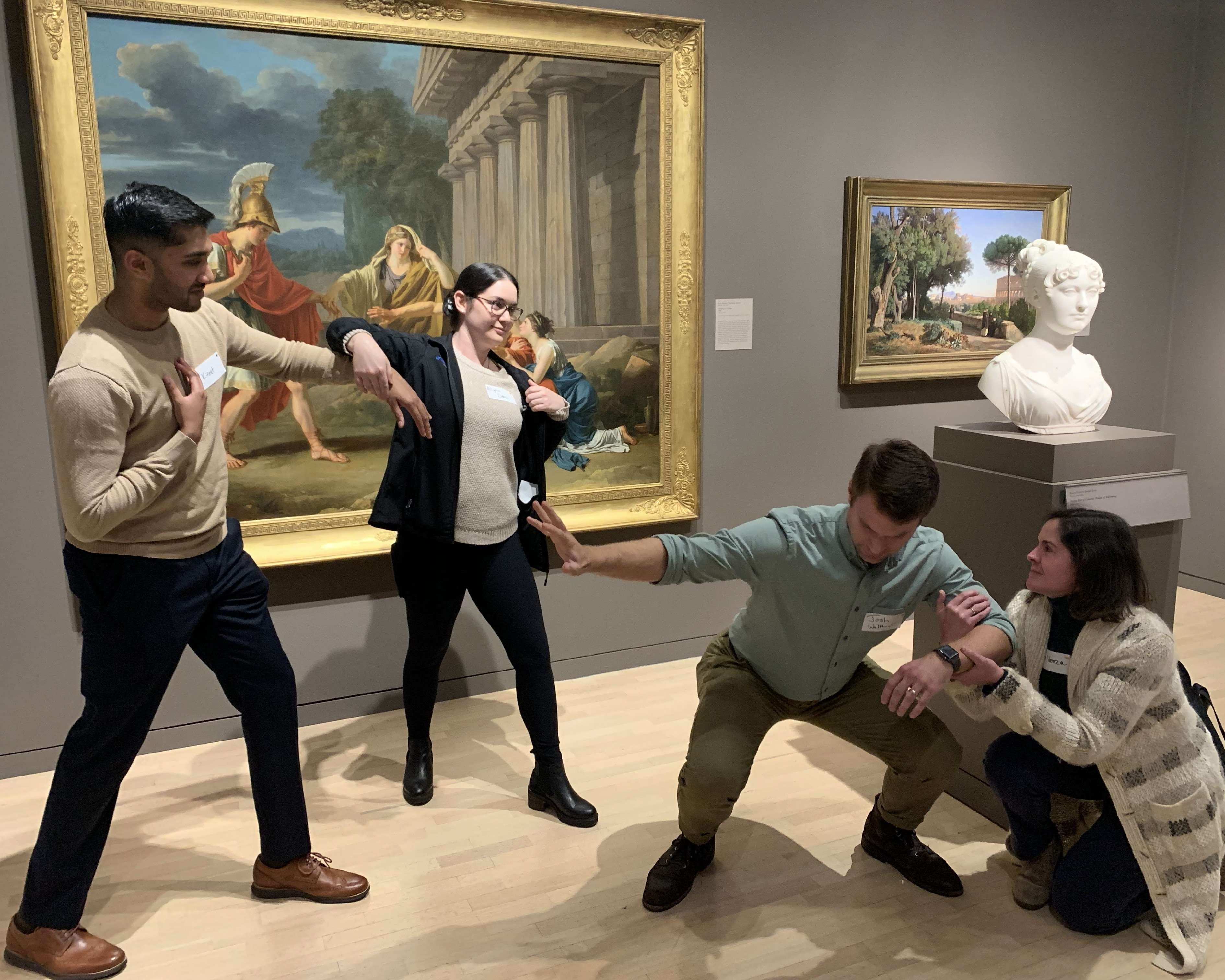 four people at art museum