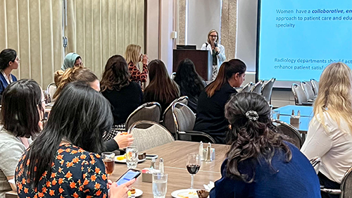 A speaker at a dinner presentation