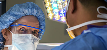 two surgeons in masks