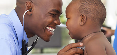 doctor smiling at a baby