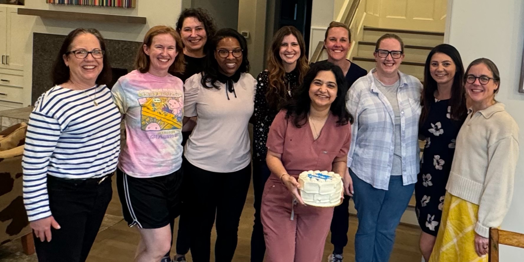 group of people with cake