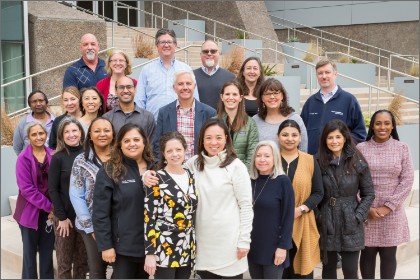 A group of clinicians in white coats