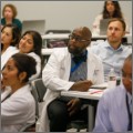 Faculty members in a learning space