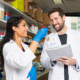 Two researchers enjoying their work