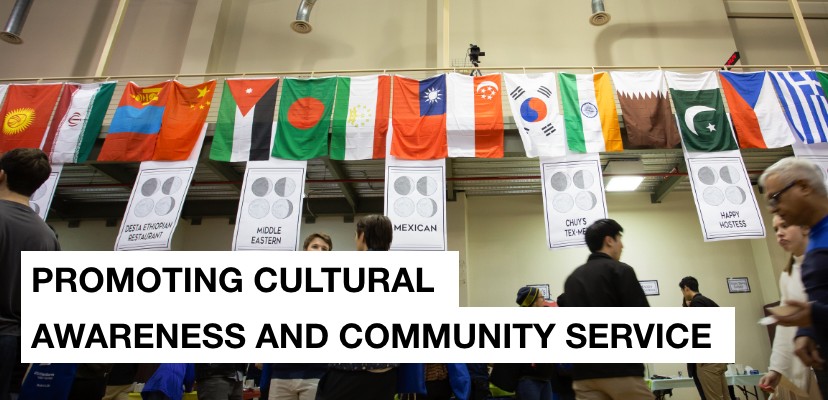 People standing in front of flags of many nations and the message: promoting cultural awareness and community service