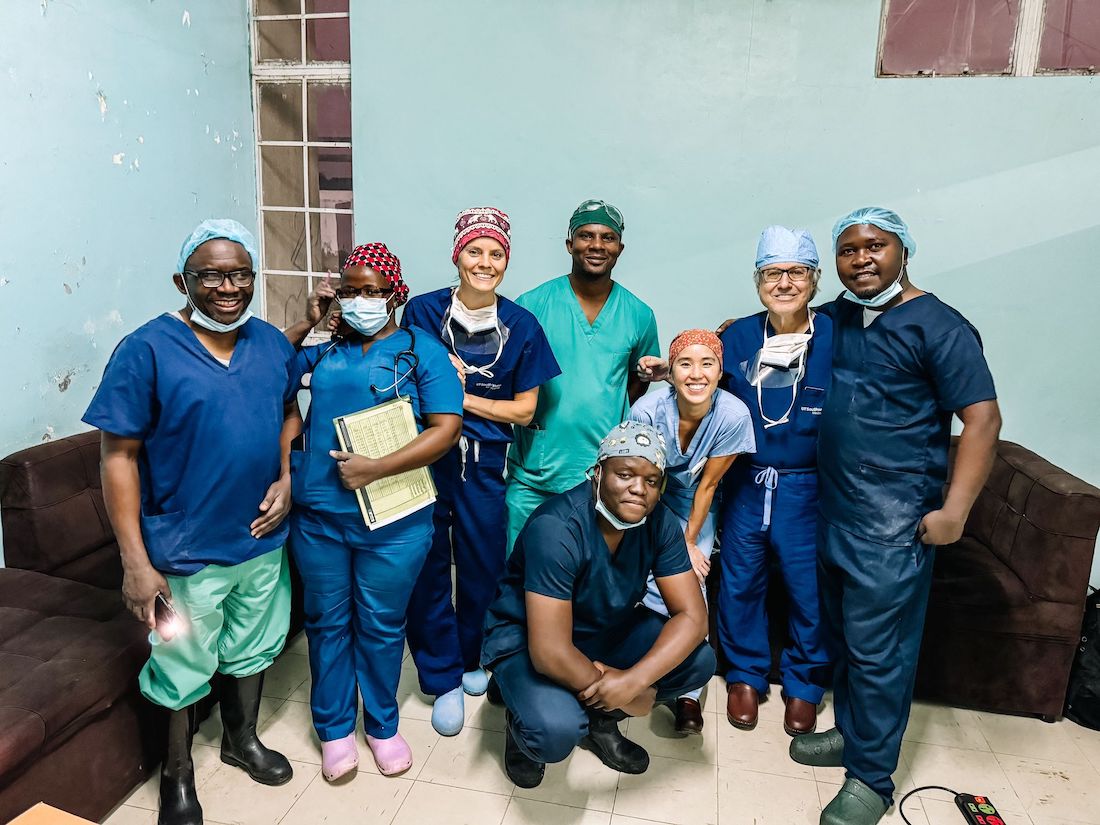 Roger Bedimo, M.D., (left), Director of UTSW’s Office of Global Health, and Joseph Schaffer, M.D., (second from right), with colleagues